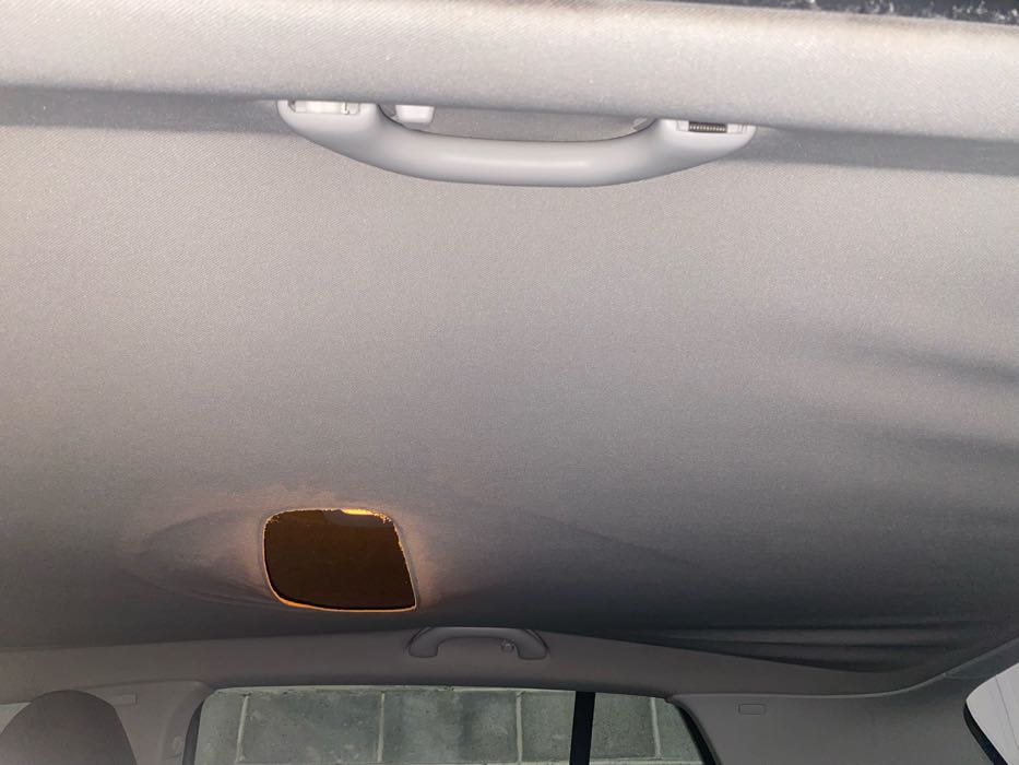 Volkswagen Passat roof lining repair